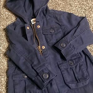 Navy jacket with metal zipper and lots of pockets
